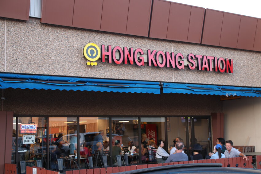 People sit outside Hong Kong Station restaurant in Centennial on Sept. 6. Inside, staff were busy with dinner customers.